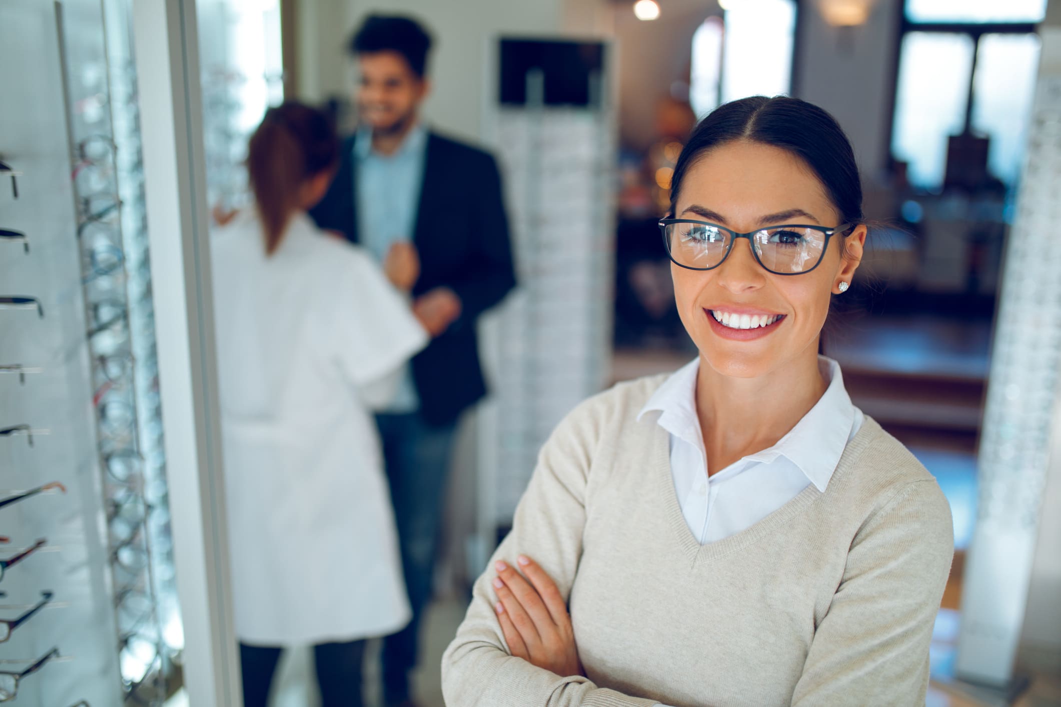 Woman wearing eyeglasses at the optical store.